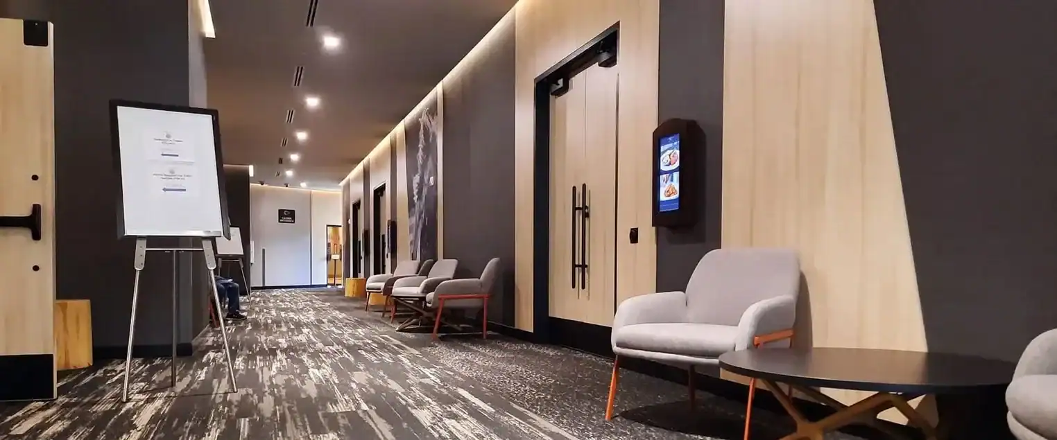 Commercial Hotel Lobby Interior Painting A modern hotel lobby or common area with comfortable seating and stylish interior painting.